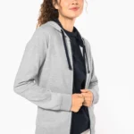 Damessweater met rits en capuchon in contrasterende kleur