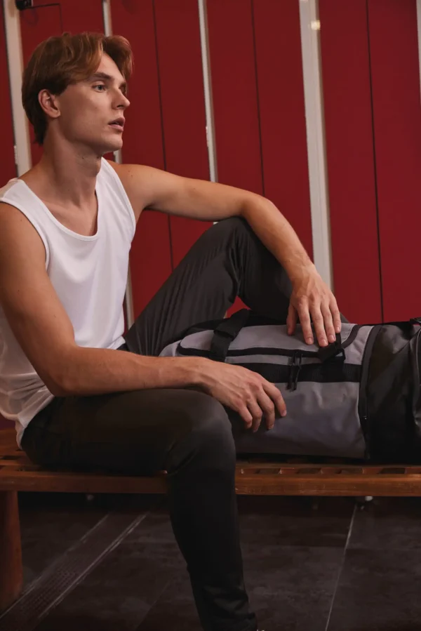 Sporttas in kokervorm met afzonderlijk schoenenvak