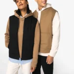 Ecologische gevoerde uniseks bodywarmer van twill met teddykraag